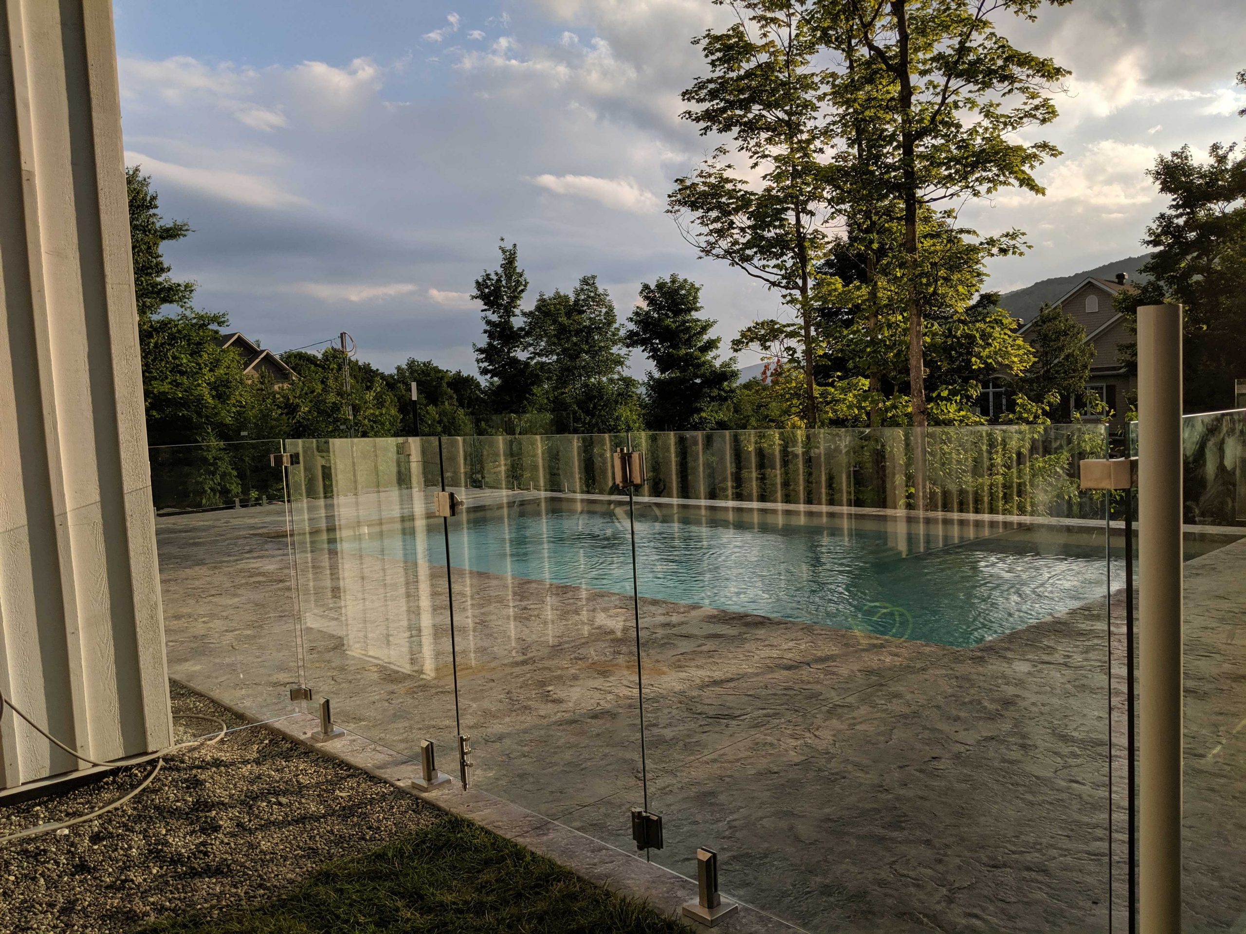 Keep Your Children, Pets and Pool Regions Safe with a Frameless Glass Fence